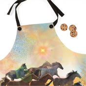 An apron with a colorful design depicting a group of running horses. The apron features a celestial and abstract background with light bursts, gradients, and splashes of color. Three chocolate chip cookies are placed next to the Sunrise Horse Run Apron by Printify, making it an ideal piece of inspirational wear that radiates soulshine.