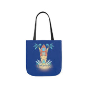 Introducing the Surf's Up Good Vibes Only Beach Tote by Printify: a blue tote bag featuring an illustration of a surfboard with tribal designs, surrounded by palm trees and ocean waves. The bottom of the design includes the text "Good Vibes Only." This artistic expression piece has black handles and encourages you to dare to inspire.