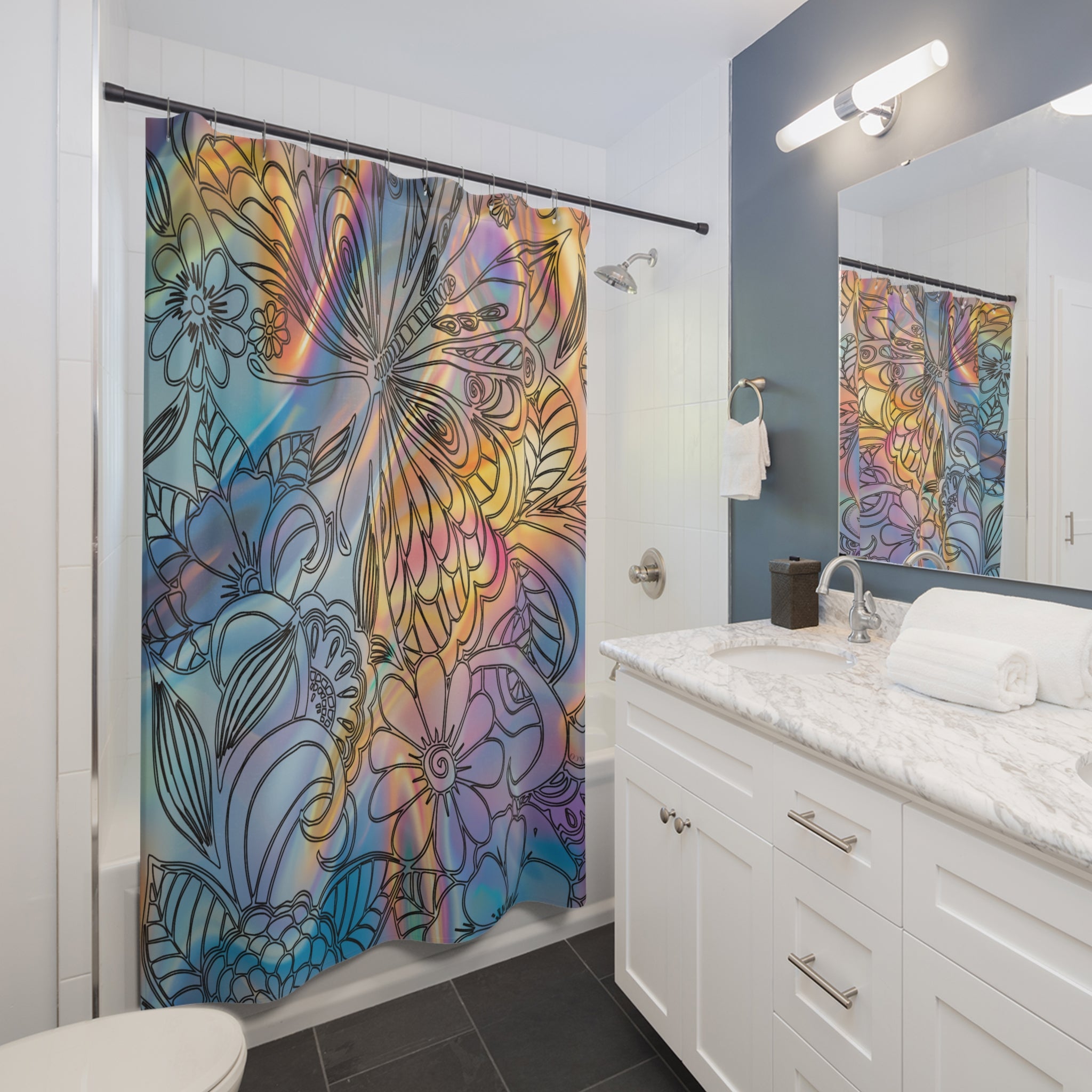 A bathroom showcases the vibrant Urban SoulShine & co Spring Mandala Custom Shower Curtain, boasting original abstract floral patterns. The room is completed with white walls, a dark floor, a large vanity topped with marble, and a mirror. A towel hangs from a rack beneath light fixtures mounted above the mirror.