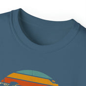 Close-up of a dark blue crew neck t-shirt with a vintage-style design featuring a semi-circle of color bands in orange, yellow, blue, and green. Only the upper half of the design is visible in the image. This Spooky Nights Halloween Ultra Cotton Tee (Unisex) by Printify encourages you to express yourself with style.