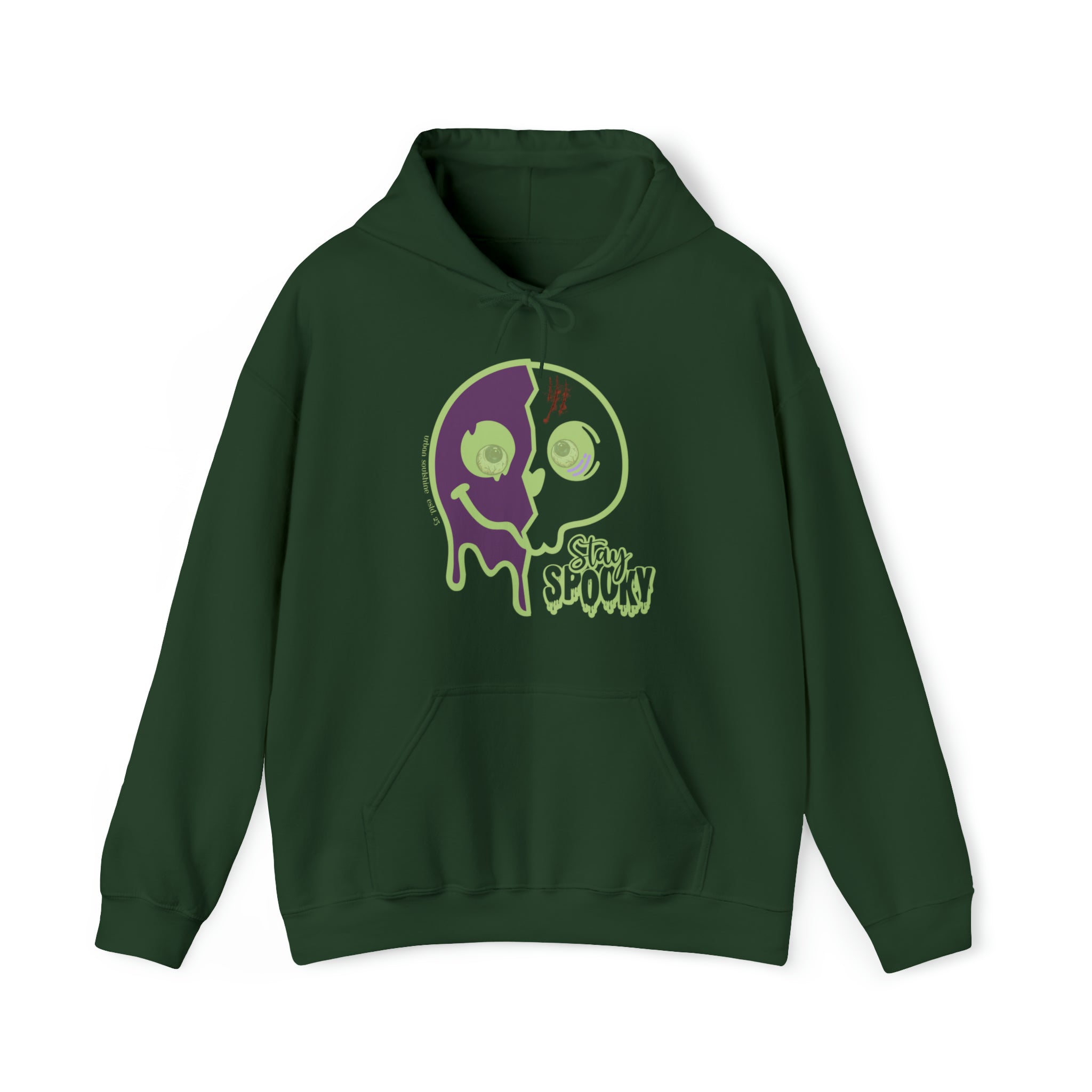 The Printify Stay Spooky Funky Faces Halloween Hoodie (unisex) is a dark green hoodie featuring a graphic of a split face in green and purple, with one eye open and a dripping effect. Text below the image reads "Stay Spooky!" The hoodie has a front pocket and drawstrings, offering both comfort and artistic expression.