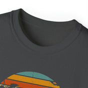 Close-up of a dark-colored Spooky Nights Halloween Ultra Cotton Tee (Unisex) by Printify with a retro-style graphic that embodies artistic expression. The design features horizontal stripes in yellow, orange, and blue with abstract shapes near the bottom. The neckline of the shirt is visible.