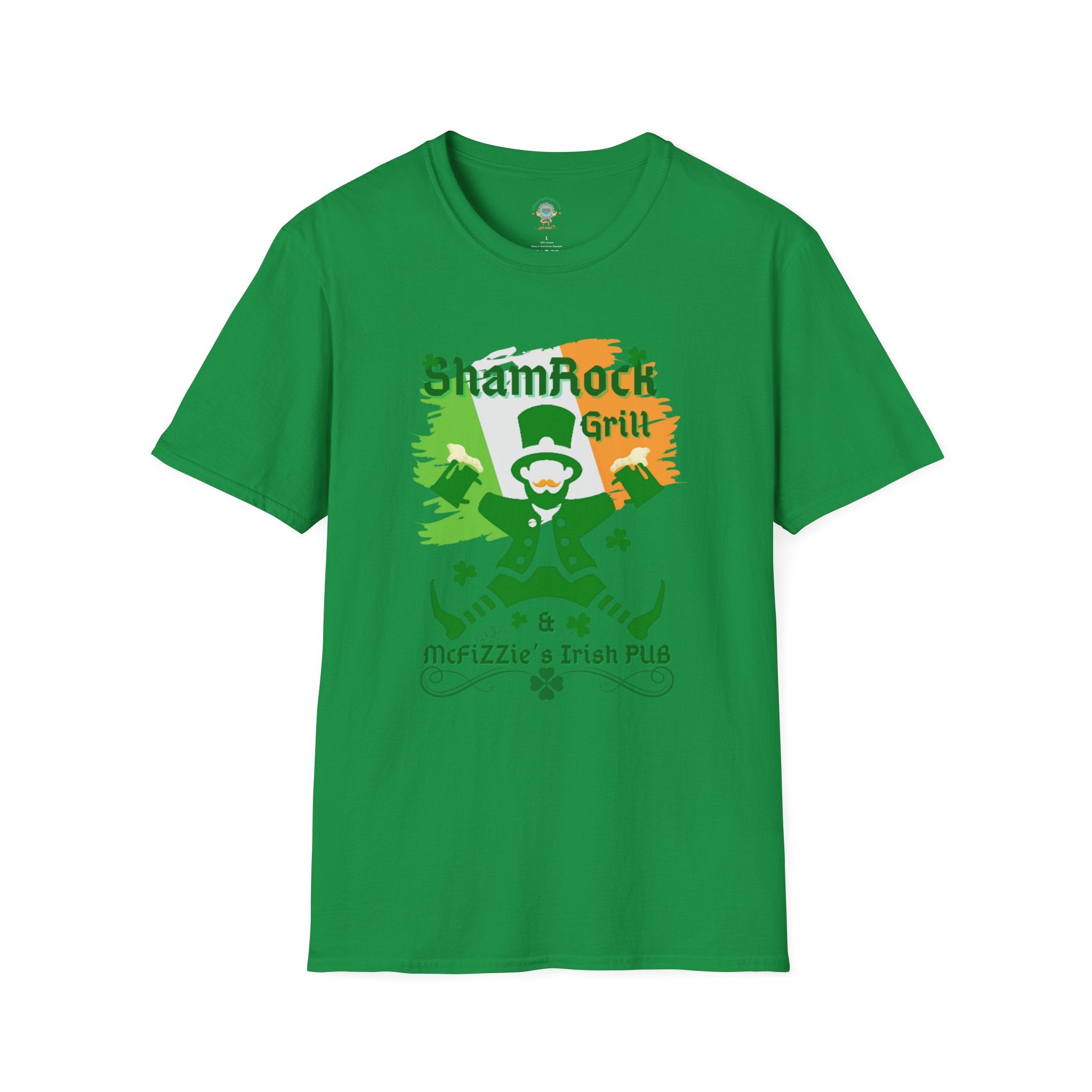 A man with curly hair and a beard sits in front of a bar counter, smiling. He's wearing a grey T-shirt with a colorful graphic of a leprechaun and text that reads "ShamRock Grill" and "McFizzle's Irish PUB" alongside a shamrock and musical notes. His Printify Shamrock Grill & McFizzie's Irish Pub SoftStyle Tee (Unisex) radiates soulshine, embodying the spirit of inspirational wear.