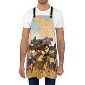 A person wearing a white shirt and an apron with a design featuring a herd of horses running through a field under a bright sky with the sun, capturing an essence of soulshine and artistic expression, specifically the Sunrise Horse Run Apron by Printify.