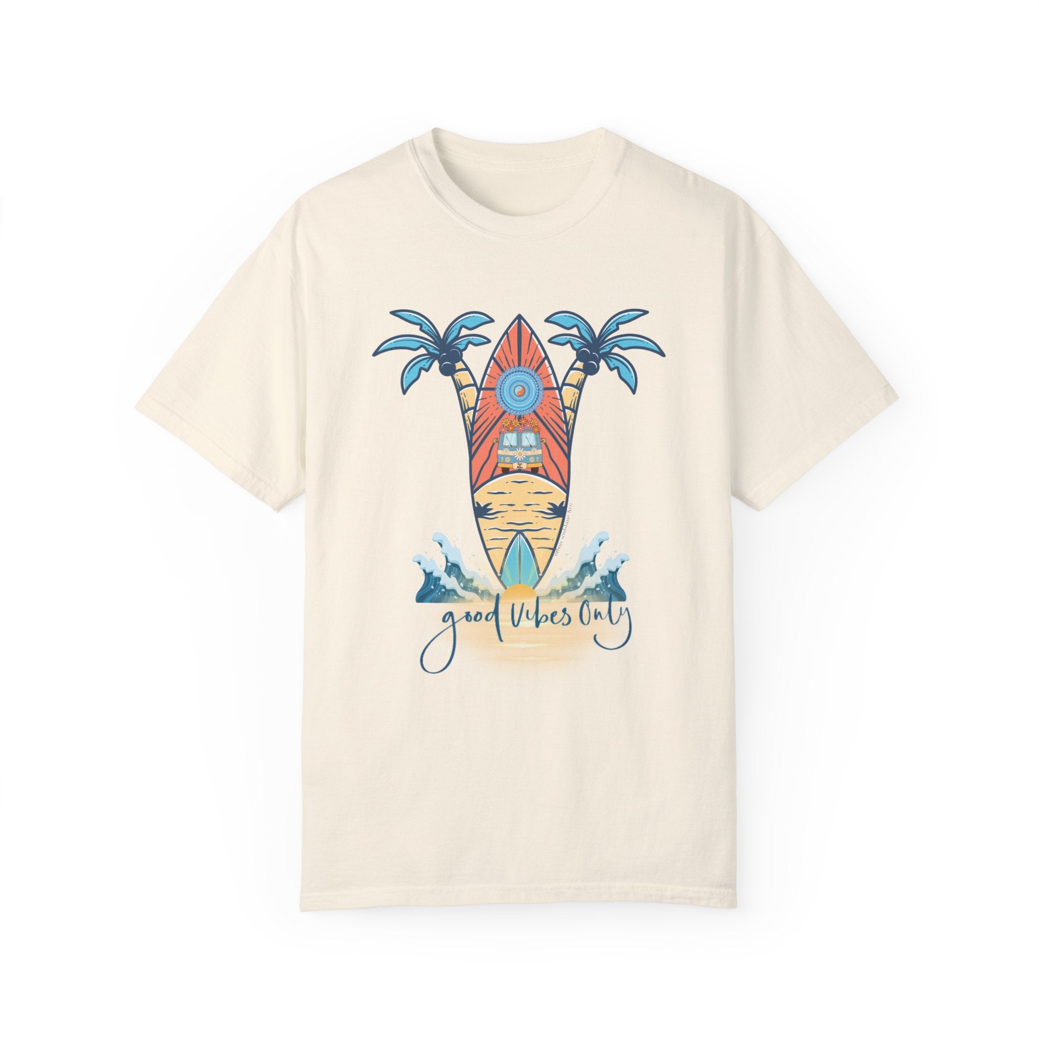 A Surf's Up! Good Vibes Only Tee (Unisex) by Printify, featuring a colorful design of a surfboard with a sun symbol in the center, flanked by two palm trees above a sandy beach with waves. The text "good vibes only" is written at the bottom, capturing an essence of artistic expression.