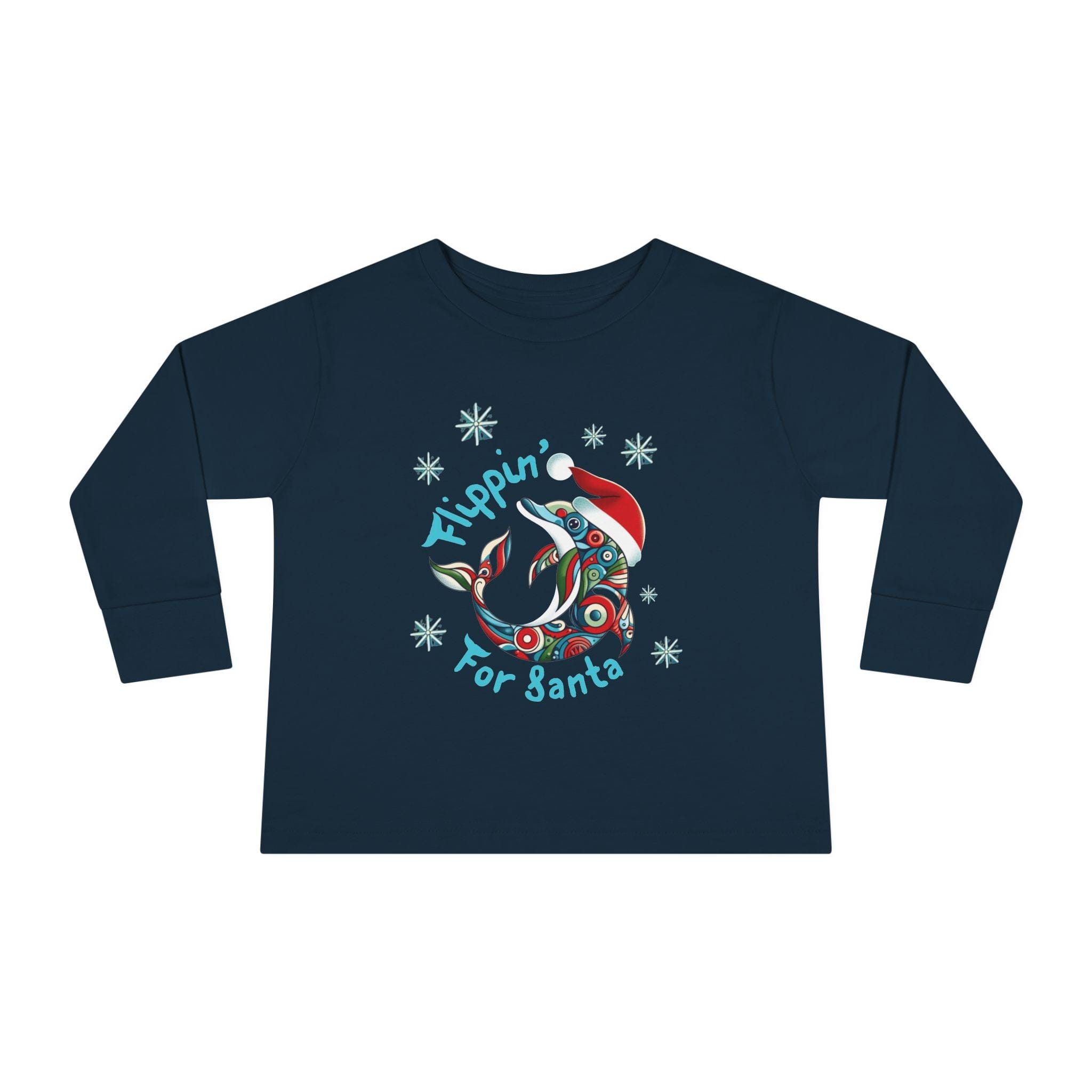 Urban SoulShine & co's Flippin' For Santa Christmas Dolphin Long Sleeve Toddler Tee is a navy blue top that showcases a lively dolphin wearing a Santa hat and surrounded by snowflakes. The whimsical font displays the text "Flippin' for Santa." Crafted from 100% cotton, this tee offers a cozy unisex fit ideal for holiday joy.