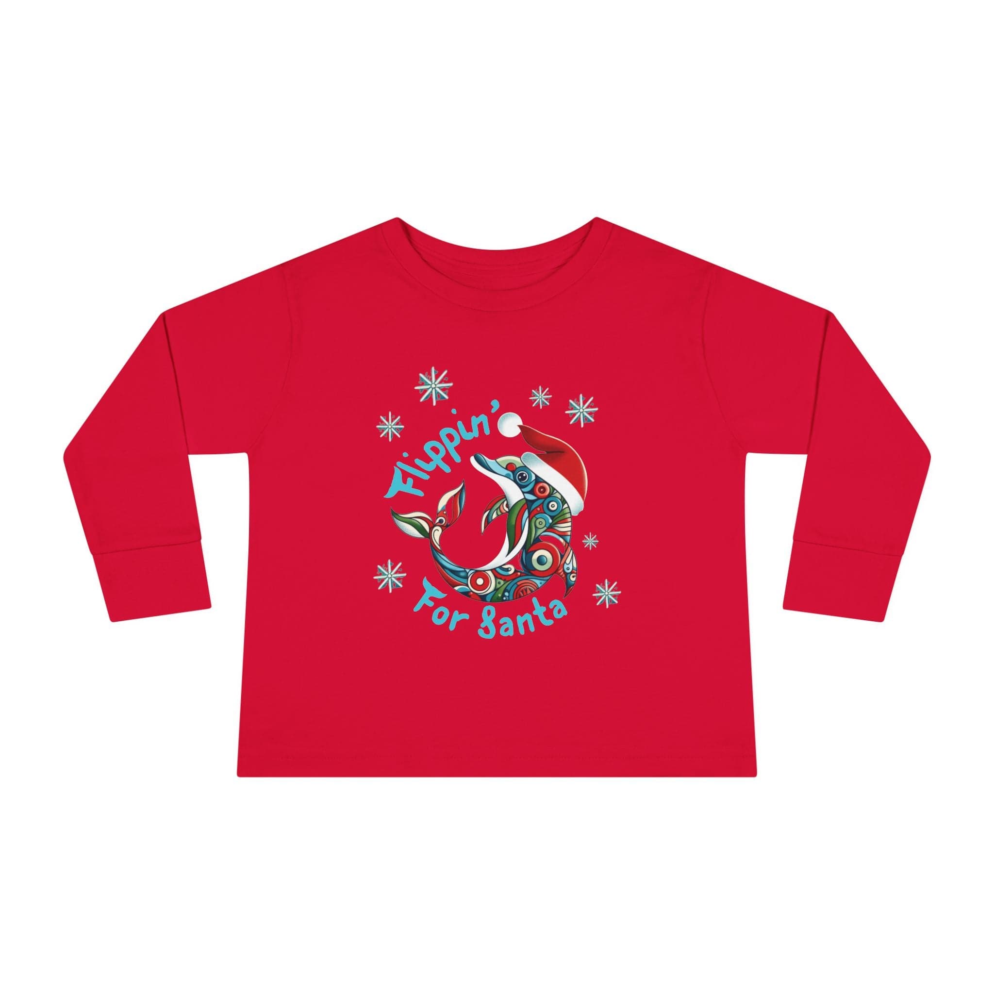 The Flippin' For Santa Christmas Dolphin Long Sleeve Toddler Tee by Urban SoulShine & Co is a unisex fit, red long-sleeve shirt that showcases a festive dolphin donning a Santa hat, surrounded by snowflakes with the playful text "Flippin' for Santa." Crafted from 100% cotton, it’s ideal for spreading holiday joy.