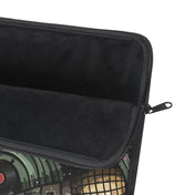 A detailed image of the Urban SoulShine & co Music Festival Custom Laptop Sleeve showcases a partially open zipper, unveiling its plush fleece interior. The exterior features a lively design for music enthusiasts, with abstract shapes and patterns, including a retro vinyl record motif that adds an extra touch of style.