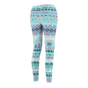 Get a glimpse of the Urban SoulShine & co's "It's Snowing Flamingos 'Ugly Christmas Sweater Style' SuperSoft Casual Leggings," showcasing an extraordinary mix of holiday cheer and tropical flair. These extra soft leggings feature a festive array of flamingos, pine trees, snowflakes, and geometric patterns in vibrant shades of teal, pink, and white.