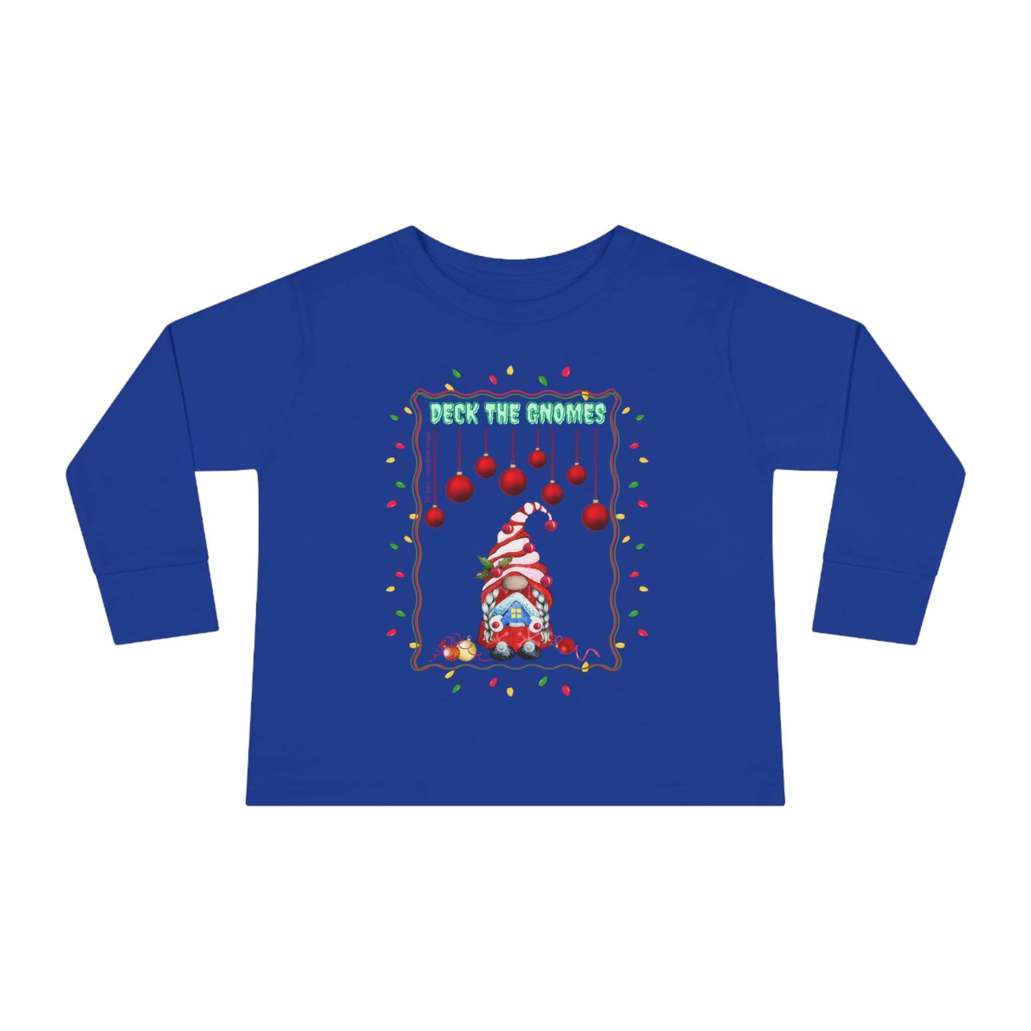 The Urban SoulShine & co "Deck The Gnomes Christmas Toddler Long Sleeve Tee" features a whimsical gnome in a red-striped hat adorned with Christmas lights on 100% cotton blue fabric. Above the cheerful gnome, the text "Deck the Gnomes" adds festive flair, while red ornaments and lights elegantly frame the design.