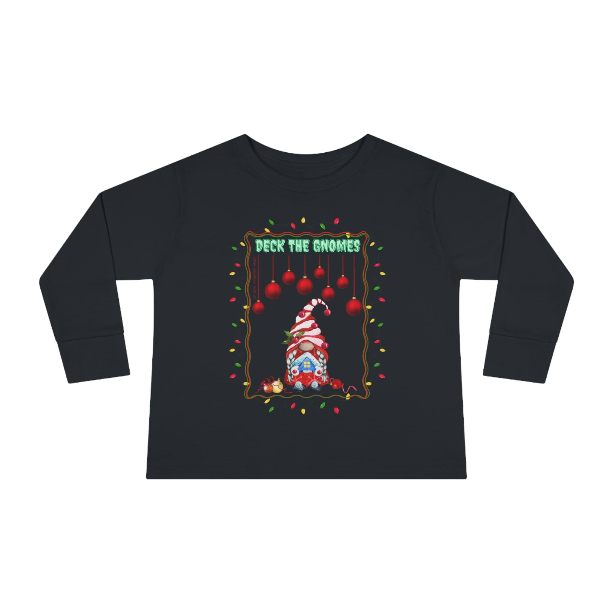 The Deck The Gnomes Christmas Toddler Long Sleeve Tee from Urban SoulShine & Co features a black design with a festive holiday gnome adorned with colorful string lights and red ornaments. Crafted from 100% cotton, it captures the holiday spirit beautifully with the phrase "Deck the Gnomes" displayed above.