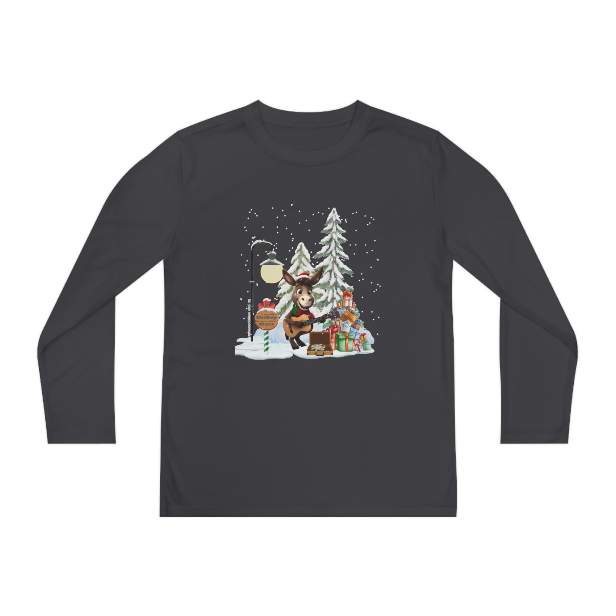 Introducing the Urban SoulShine & co Donkey Claus Street Player Christmas Long Sleeve Competitor Tee for youth, featuring a festive design with a snow-covered street lamp, a reindeer holding a "Noel" sign, and a Christmas tree surrounded by wrapped presents. Crafted with PosiCharge technology for moisture-wicking comfort, it beautifully captures snowflakes gently falling in the scene.