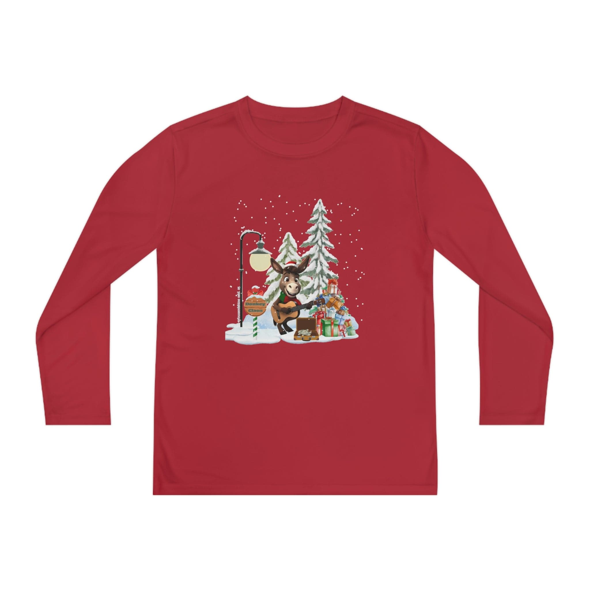 This red long-sleeve shirt from Urban SoulShine & co, featuring PosiCharge technology, showcases a donkey in a Santa hat playing guitar under a streetlamp near snow-laden trees and gifts. With snowflakes falling around, this moisture-wicking fabric from the Donkey Claus Street Player Christmas Long Sleeve Competitor Tee (Youth Unisex) captures the essence of a wintry holiday scene.