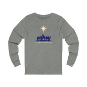 The Urban SoulShine & co For Unto Us A Child Is Born Christmas Long Sleeve Tee features a unisex design in gray with a captivating nativity silhouette, depicting three wise men and animals under a prominent star. Beneath the image, the text reads "For Unto Us A Child Is Born." This tee is crafted from soft Airlume combed cotton for ultimate comfort.