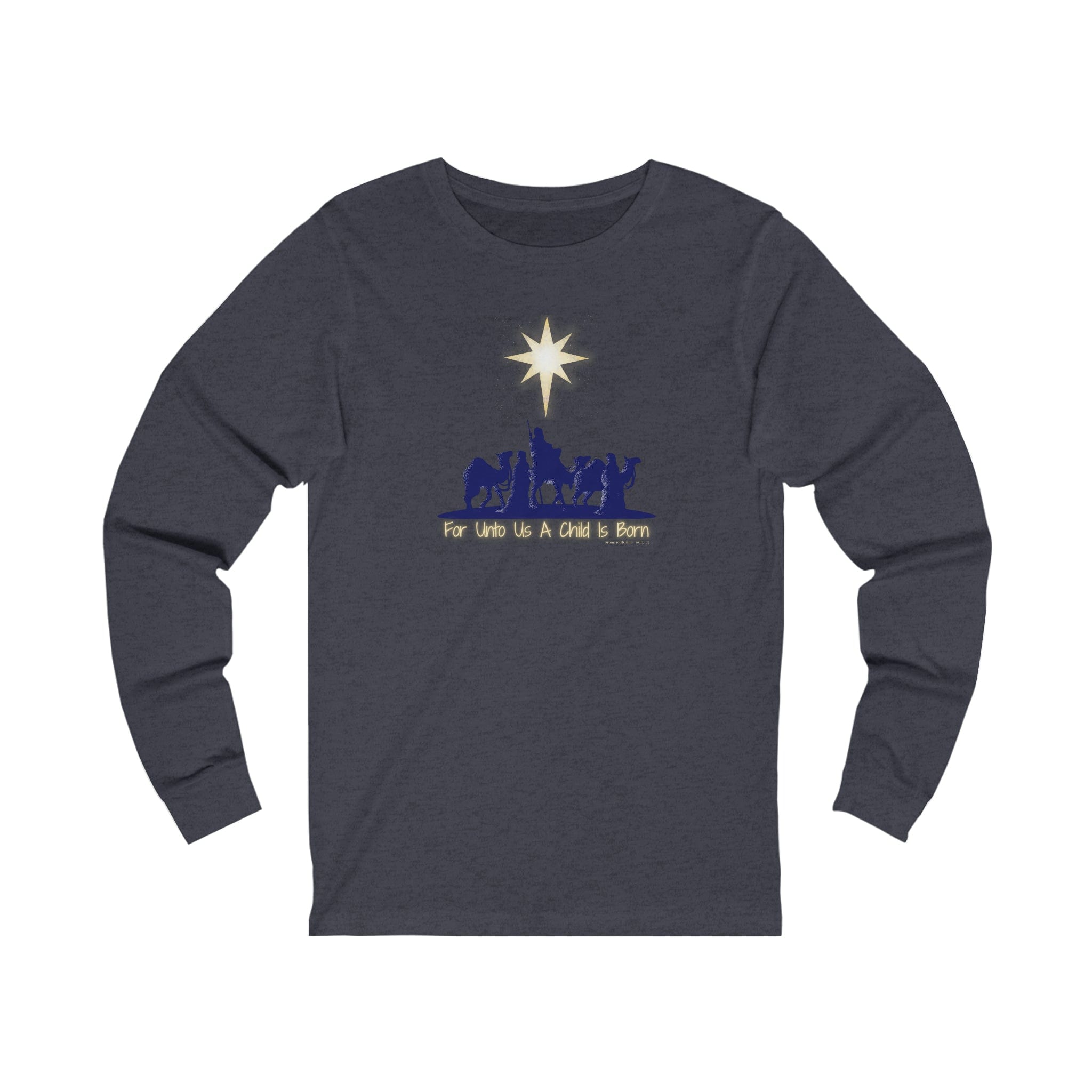 The Urban SoulShine & co "For Unto Us A Child Is Born" Christmas Long Sleeve Tee is a dark gray unisex shirt featuring a silhouette of a nativity scene with wisemen and a bright star above. Made from Airlume combed cotton, it includes the text "For Unto Us A Child Is Born" below.