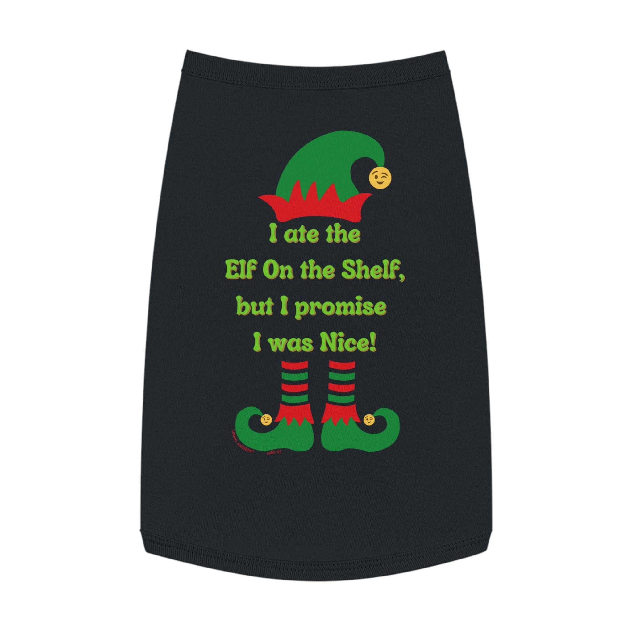 Discover the Urban SoulShine & co's "I Ate the Elf On the Shelf Holiday Pet Shirt" featuring a playful black Christmas-themed fabric adorned with green and red elf hats and shoes. The fun text reads: "I ate the Elf on the Shelf, but I promise I was Nice!" This cheerful shirt is perfect for creating festive custom pet clothes and is designed to be machine wash safe for easy maintenance!