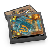 The Happy Festival Of Lights Hanukkah Jigsaw Gift Puzzle by Urban SoulShine & co, available in 120, 252, and 500-piece versions, features an image of a blue and gold dreidel crafted from high-quality chipboard. The box's open lid reveals partially completed puzzle pieces scattered inside. In the background, twinkling gold coins and festive lights set the scene—a perfect holiday gift.