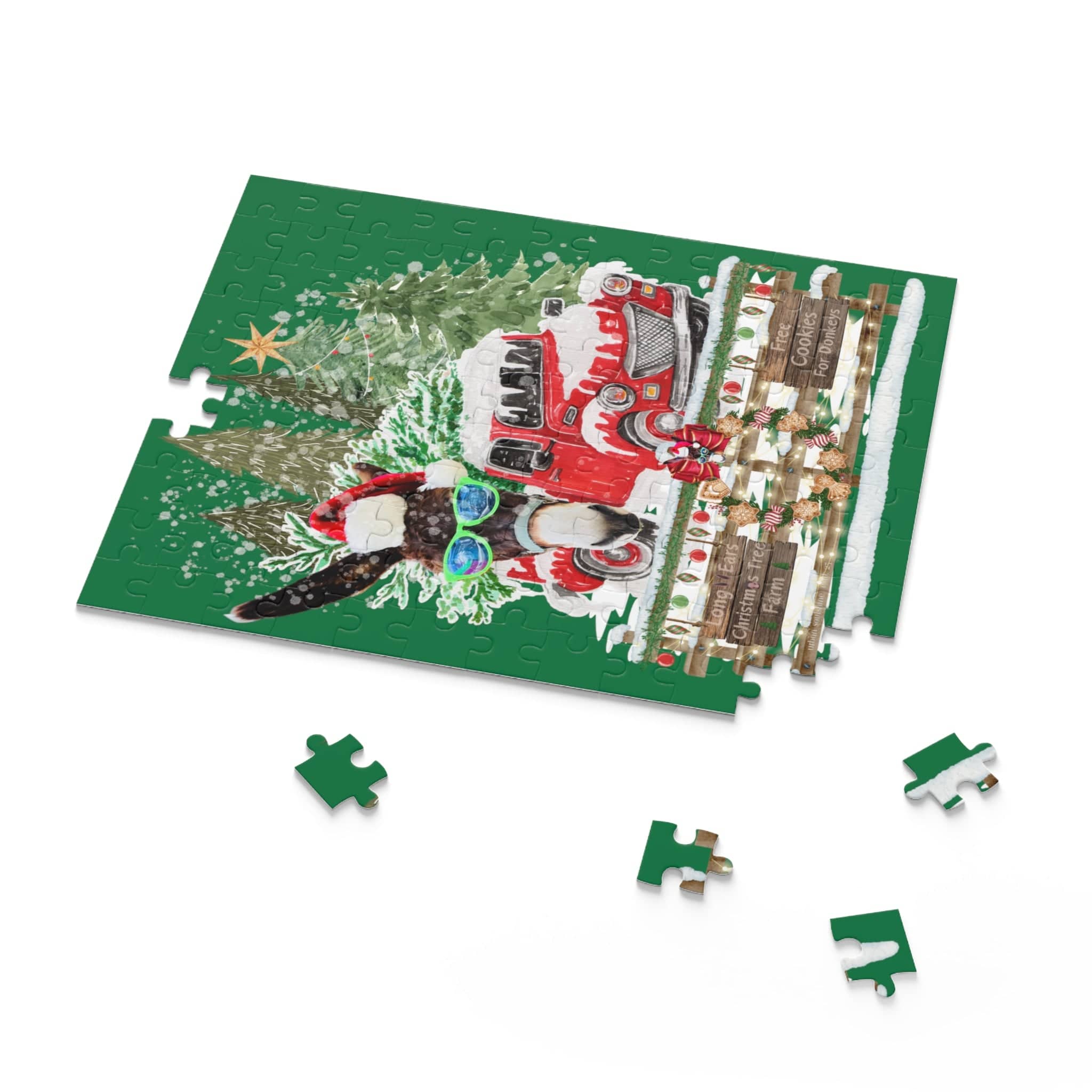 The Long Ear Christmas Tree Farm Donkey Claus Jigsaw Puzzle by Urban SoulShine & co features a charming festive scene, complete with a red truck, Christmas trees, and a gnome. Crafted from high-quality chipboard, several scattered pieces lay around against a green background, ideal for an attractive gift-ready box presentation.