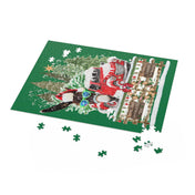 On a green backdrop, a partially assembled Urban SoulShine & co Long Ear Christmas Tree Farm Donkey Claus Jigsaw Puzzle reveals a festive winter scene featuring a red truck amid snow and trees. Crafted from high-quality chipboard, several loose pieces linger around the edges, all neatly contained in an attractive gift-ready box. Available in 120, 252, or 500-piece sets.