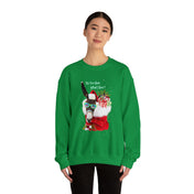 A person is wearing a vibrant green unisex sweatshirt from Urban SoulShine & Co, featuring a llama sporting a Santa hat and sunglasses while holding gift boxes. The text on this festive heavy blend crewneck reads "Do You Hear What I Hear Donkey Claus Christmas Sweatshirt," making it pop against the plain white background.